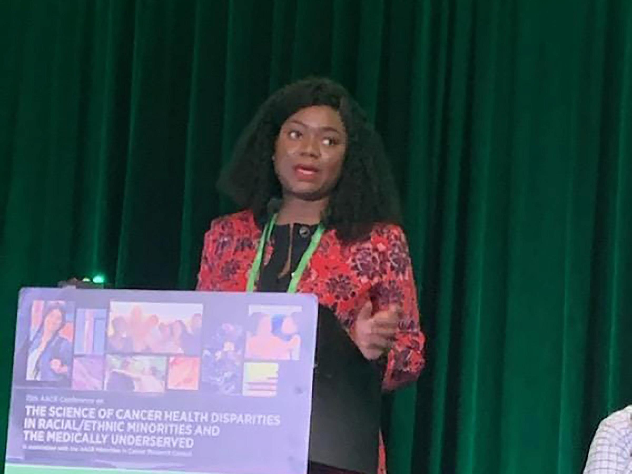 Dr. Mmadili Ilozumba giving an oral presentation as an invited speaker at the American Association for Cancer Research (AACR) conference on the Science of Cancer Health Disparities in Racial/ Ethnic Minorities and the Medically Underserved. 